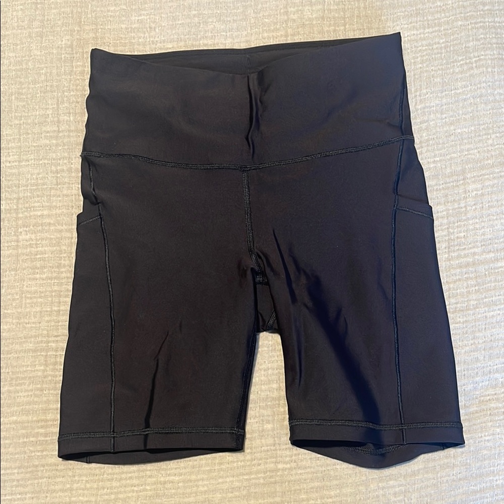 Athleta Interval Stash 7” Black Biker Shorts